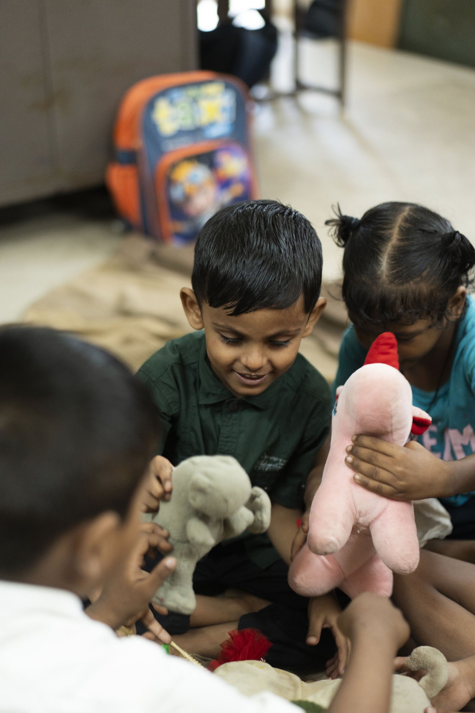A child receiving school supplies