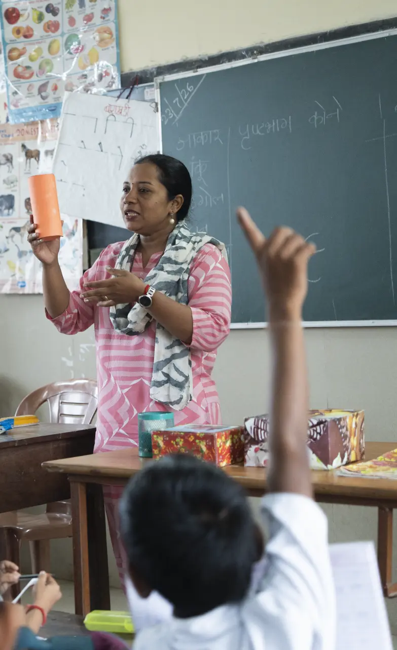 Mother teaching kids